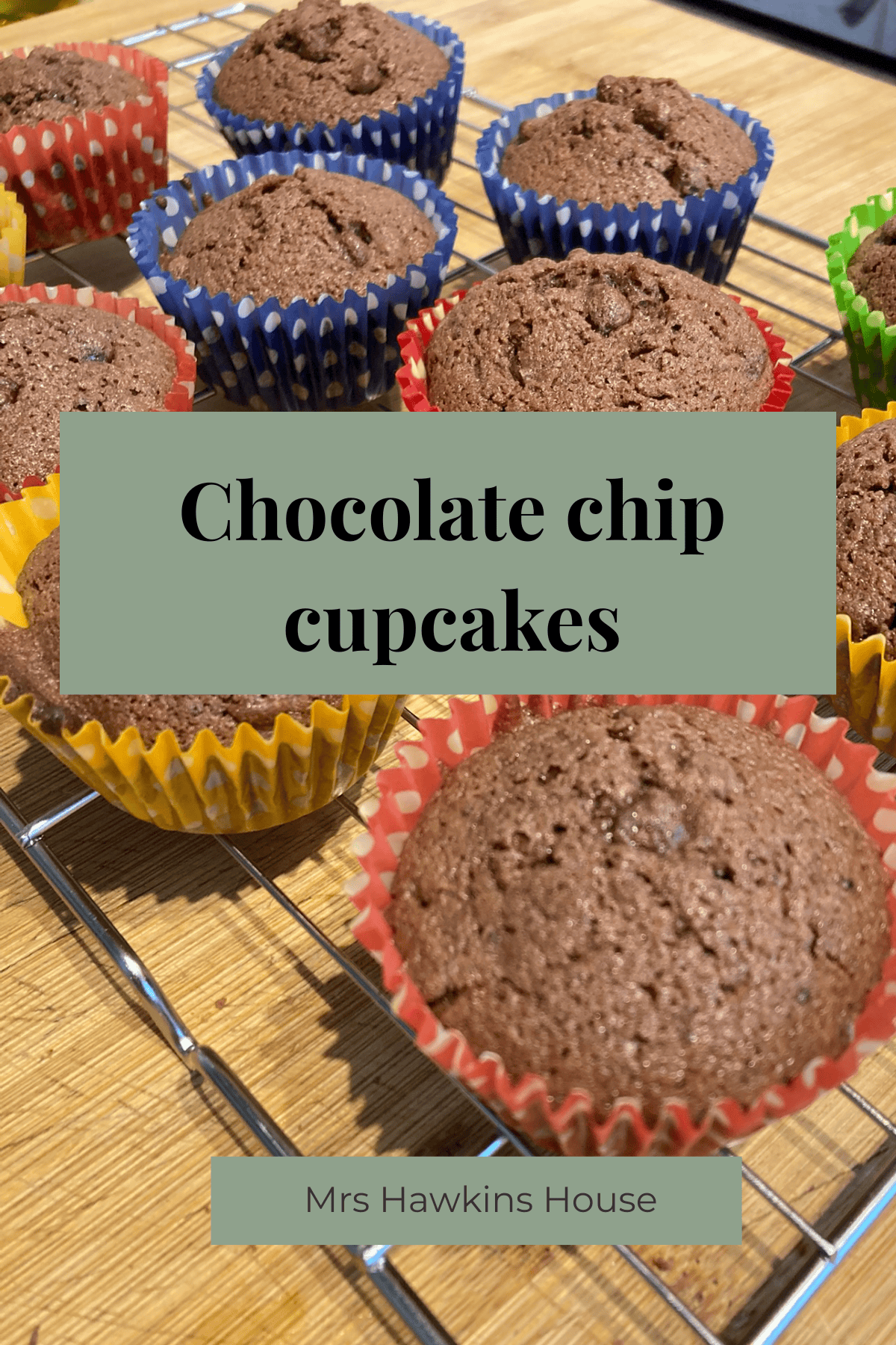 This is an image of finished chocolate chip cupcakes on a cooling rack