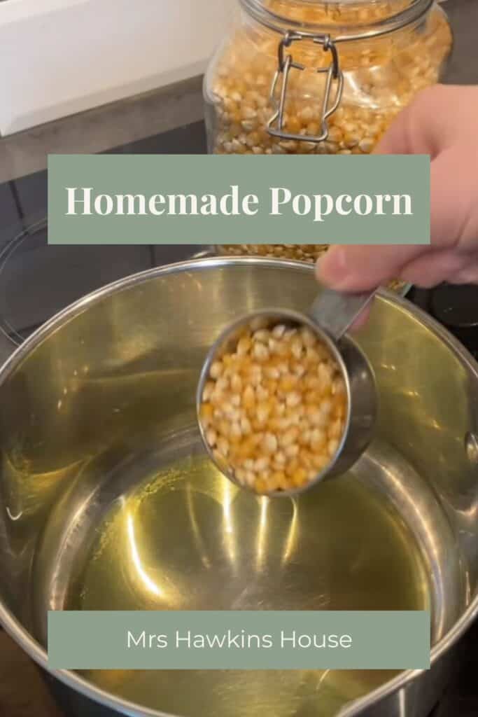 Pouring popping corn into a pot